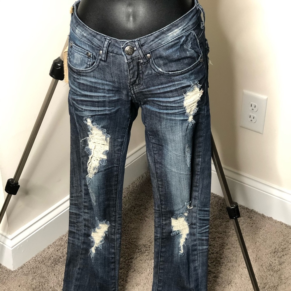 Machine denim distressed jeans